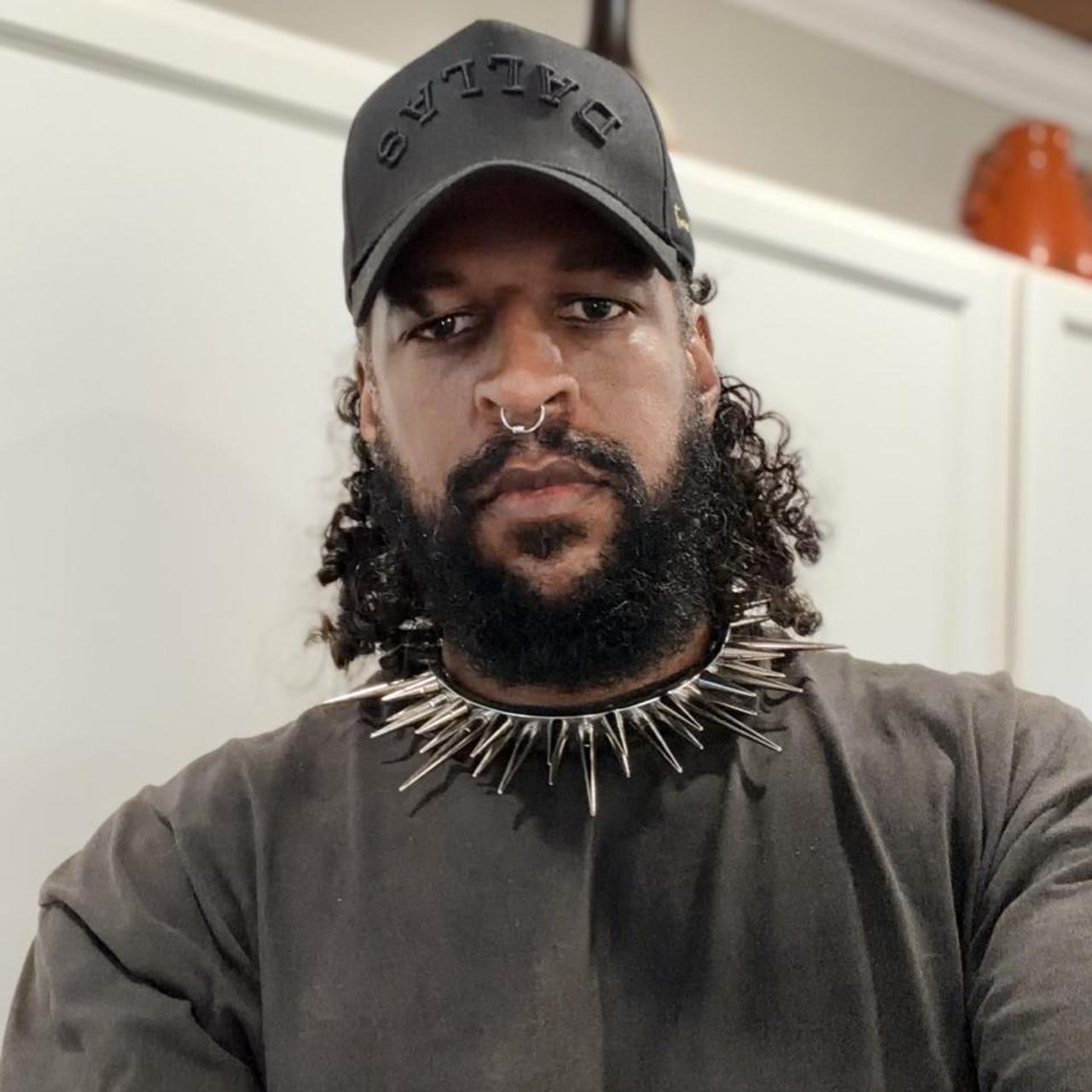 North West Apparel founder wearing a handmade spiked steel collar